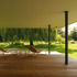 The elevated sitting room extends the house towards the river