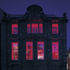 At night the auditorium shines out from the Monmouth Street facade