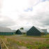 Each building has two larch elevations, and two where the slate runs down to the ground