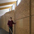 A cork-clad sensory wall helps children to orient themselves around the school