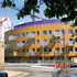The housing mediates the scale of the terraced houses and Westfield