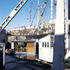Visitors board the ship by a gangplank which leads from the Maritime Heritage Museum