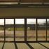 Looking out onto the agricultural landscape from within the building
