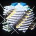 Exploring atria. Yellow for balconies. Offices cut off from curved facade by the structure