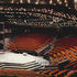 In the auditorium muted colours are enlived by rows of small, bright house lights