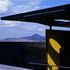 Overhanging roof canopies help alleviate the ‘bunker’ feel