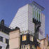 A lift tower seen over the neighbouring buildings