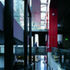 Stairs and walkways cling to the red enamelled wall, offering a continually changing vista – the architect set out to design ‘journeys rather than spaces’