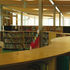 Main space looking toward the front with the tinted glass lighting the timber fins, plus occasional rooflights
