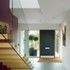 Stair treads cantilever from the double-height end wall