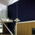 Oak-faced panel doors and matt grey basalt worktops meet the client