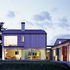 Southern and eastern elevations are cedar clad and extensively glazed