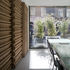 Multi-plywood and oak tri-ply screens with battens to improve acoustics