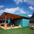 Sheltered play area with sky-viewing rooflights (beyond is the primary school)