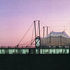 The transparent quality of the building shown at dusk