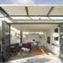 The living room opens to an enclosed terrace
