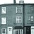 North elevation, the black door and bay mark No 78, with Mackintosh interiors; to the left is the narrow, rebuilt No 80