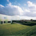 Working with artist Michael Craig-Martin, coloured transparent polycarbonate panels were mounted in front of the glass, serving as a protective sun shield and improving the building
