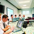 Adjustable height desks with tops of recycled plastic