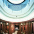 Bar area at foot of atrium, with serving hatch in the centre of the wall