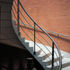 The grand spiral staircase up from the entrance loggia to the reception gallery and hall