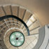 Looking down the spiral staircase to the large sunken uplighter at its base