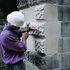 New carving on the gate piers of the forecourt, being carried out by Duncan Strachan