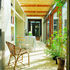 The conservatory has as much the feel of a corridor as a room
