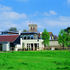 A modern family house that integrates itself with the farms variety of existing building styles