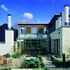 The architecture busily articulates every external surface, creating a smaller scale