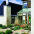 The house focuses on the client’s landscaping.  Render echoes local earth walls