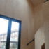 The interior walls and ceiling of the space are insulated, sealed with a high-performance vapour control layer, and lined with spruce plywood to create a timber ‘box’ within the Cor-ten shell