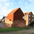 The studio inhabits a ruin and expresses the internal volume of the existing Victorian structure as a Cor-ten steel 