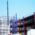 Most beams are of the ‘cellform’ type, with frequent circular holes that allow the flexibility for a multiplicity of services penetrations and with studs welded to the top flanges to achieve composite action through the slab