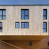 Projecting bay with untreated larch board cladding