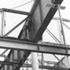 Lower promenade beams hung from the spine girder