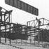 Facetted spine girder being hoisted into place