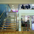 The space above the reception area serves as an extension of the cafe at lunchtime