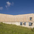 Built on a steeply sloping greenfield site
