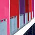 Coloured partitions between first floor classroom balconies