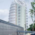 Contrasting with the verticality of the tower is a low, flat podium which contains most of the display, education and research facilities and offices