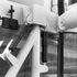 Sliding and rotating joints to accommodate vertical displacement in the structure