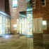 Multiple reflections project coloured light into the courtyard