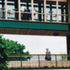 Tournament referee Alan Mills pacing across one of the bridges - press bar facilities spread over the 