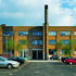 An existing outsize chimney has been reinvented as a three-dimensional entry sign
