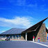 Acute copper roof pitch defines main entrance