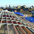 Radiating, square, curved timbers support the roof