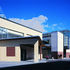 Main Entrance defined by an acute canopy confined by the restraints of the site