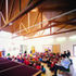 The school hall can be used with a small platform as a stage or turned round to use the  opening at the back of the hall as a proscenium arch