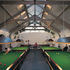 The snooker hall is screened from the bar by a partly opaque acoustic glass wall